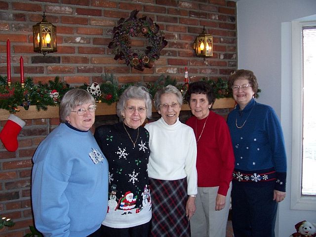 Mary (on the left) and her friends in December 2005 have been meeting every month since before 1995